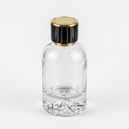 100 ml Dağ şişe, doğal dokulu siyah-altın kapaklı fotoğraf